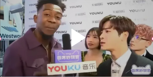 Desiigner and Jackson Wang in an unexpected interview dance-off, surrounded by laughter and pure entertainment vibes.