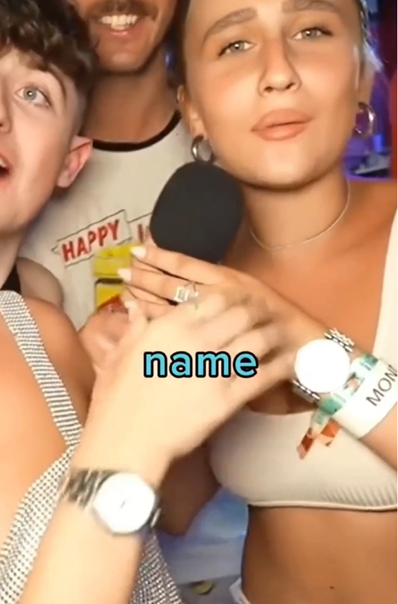 Confused model reacts as a man interrupts her introduction with a 'Free Palestine' statement in viral video.