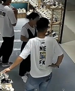 Woman approaches a stranger in a store, thinking he's her partner.