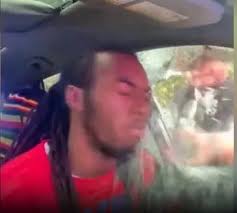 Deputy’s fist striking the SUV window, glass shards flying inward.