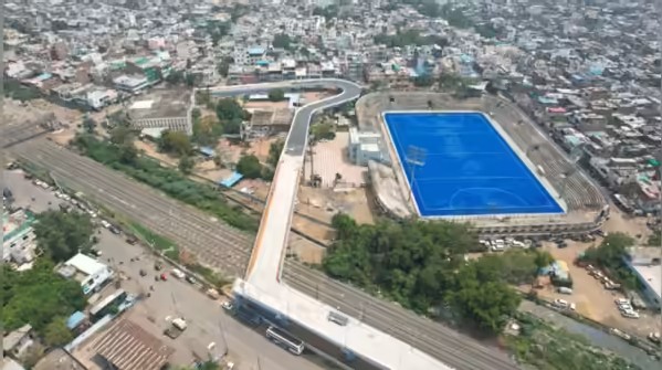 A newly constructed railway overbridge in Bhopal showing a sharp near 90-degree turn in its design.