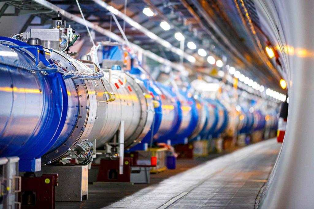 Interior of CERN’s Large Hadron Collider tunnel showing a long chain of accelerator magnets extending into the distance.