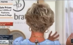 Toni Brattin seen from behind while speaking during a live QVC wig demonstration that later went viral following an accidental verbal slip.