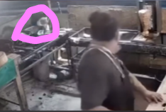 The moment a taco vendor reportedly encountered an unexplained movement while cleaning his workplace. Screenshot from security camera footage."